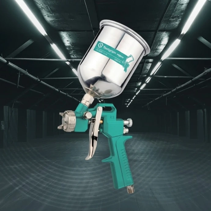 Professional spray gun designed for smooth and uniform material application