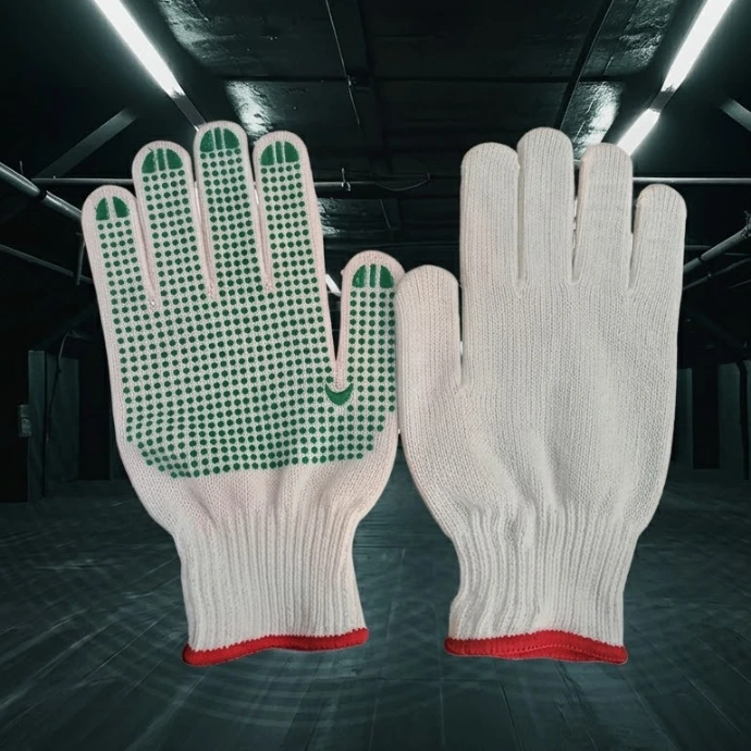 Knitted work gloves with PVC dots for enhanced grip and protection